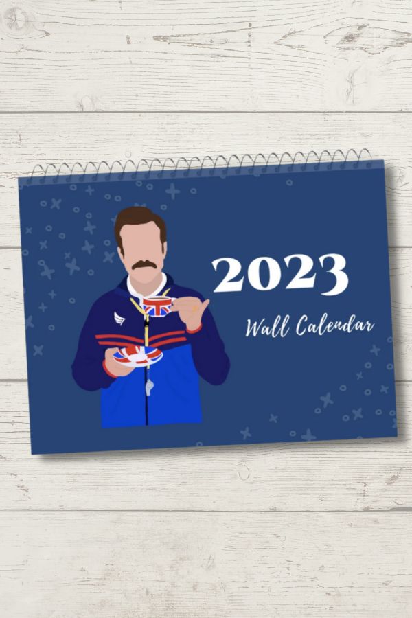 Ted Lasso 2023 wall calendar from Golden HR Graphics will make it easier to count the days to Season 3. Ted Lasso 2023 wall calendar from Golden HR Graphics will make it easier to count the days to Season 3.