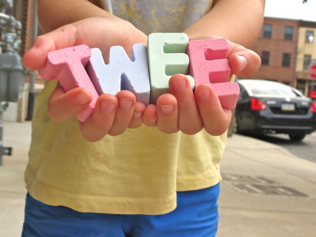 Tweemade sidewalk chalk  shaped like letters of the alphabet