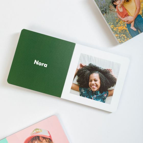Best baby shower gifts under $50: Custom baby board book by Artifact Uprising | Cool Mom Picks Baby Shower Gift Guide