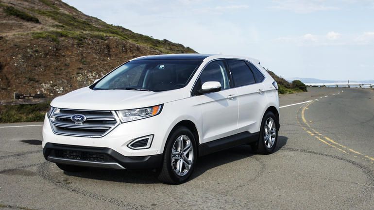 Cars for big families: The Ford Edge can fit 3 child car seats in the second row Cars for big families: The Ford Edge can fit 3 child car seats in the second row