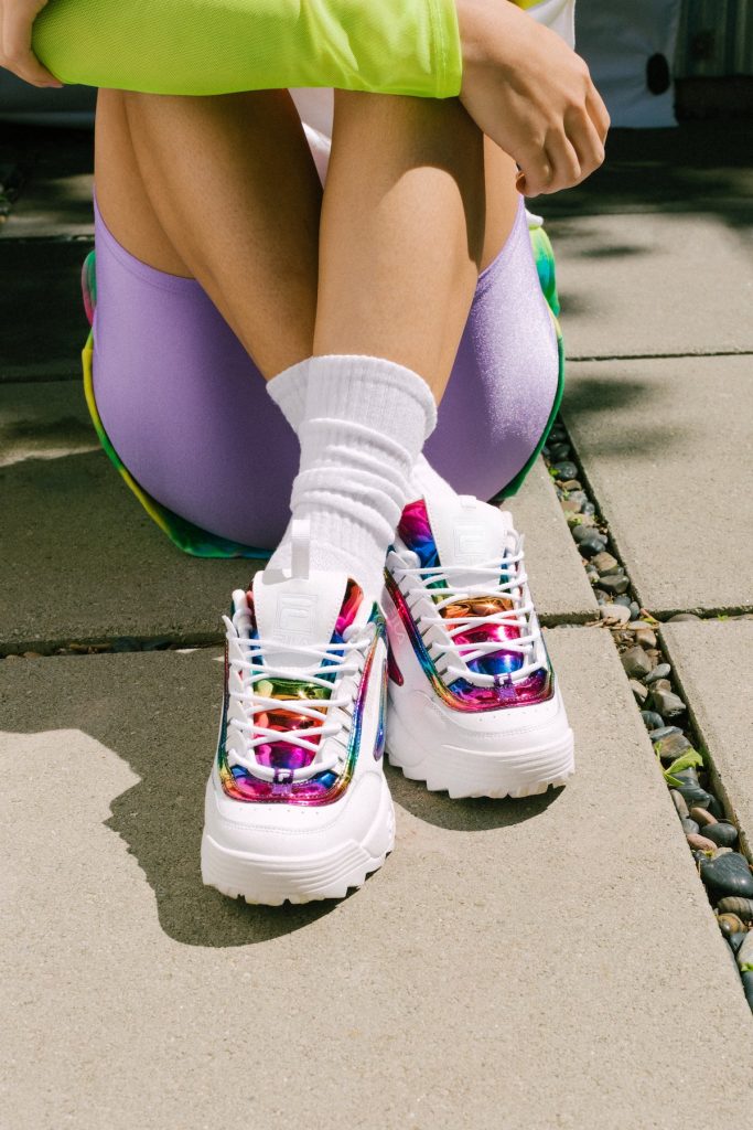 Pride month gifts that give back: Fila x Phluide Project rainbow shoes