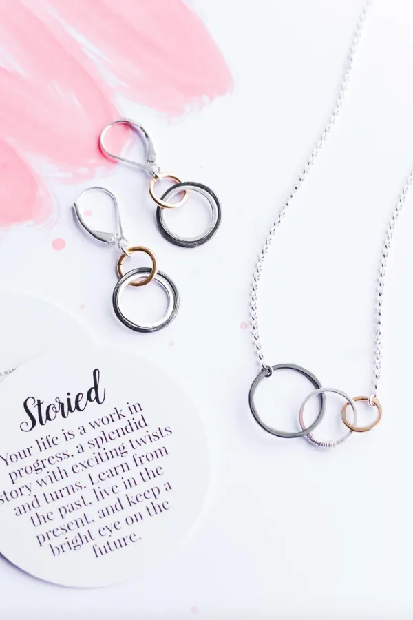 Symbolic jewelry gifts for grads: D'Iyanu gender-neutral African pendant with an Andinkra symbol of wisdom