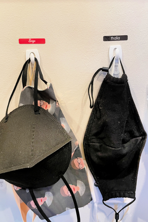 Tip: Label mask hooks using Mabel's Labels. They peel off the wall pretty nicely too (sponsor) Tip: Label mask hooks using Mabel's Labels. They peel off the wall pretty nicely too (sponsor)