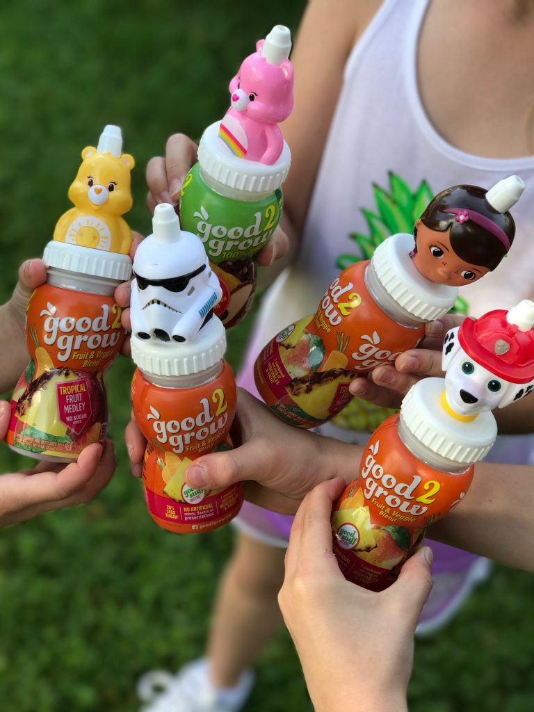 Good2Grow juice bottles have different fun caps and the bottles are dishwasher safe and can be reused: great for road trips! (sponsor) | © Kristen Chase for CoolMomPicks.com Good2Grow juice bottles have different fun caps and the bottles are dishwasher safe and can be reused: great for road trips! (sponsor) | © Kristen Chase for CoolMomPicks.com