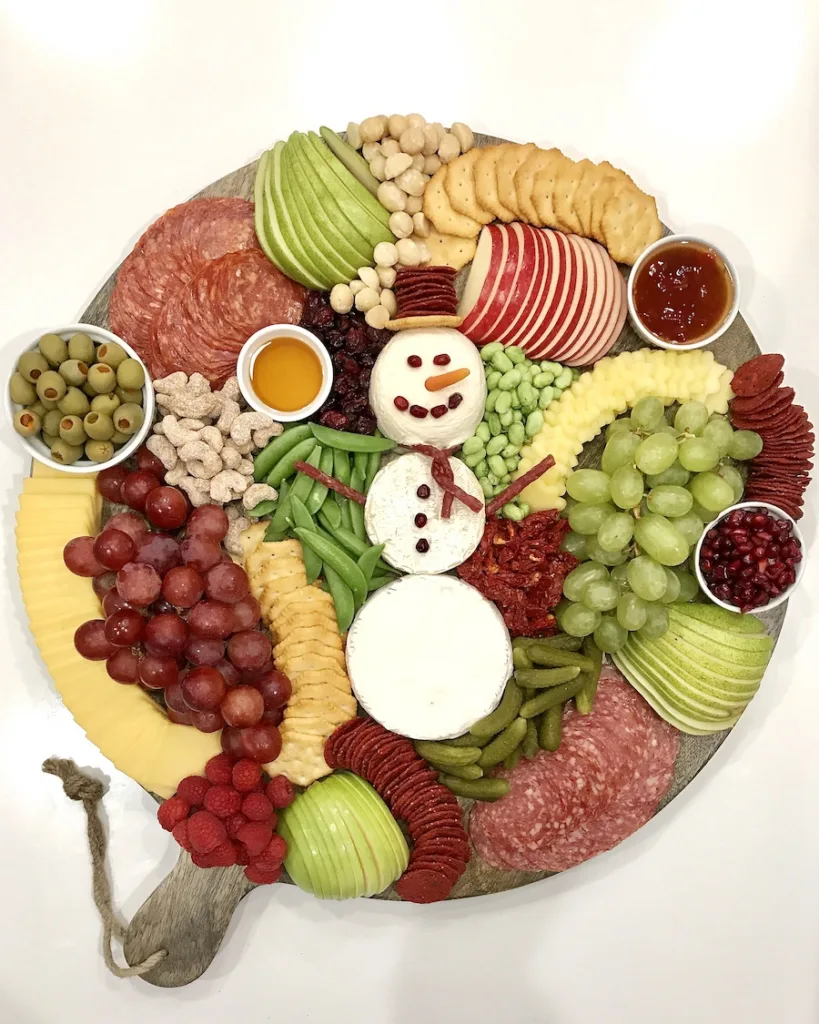 Cheesy Snowman Snack Board (The Baker Mama)