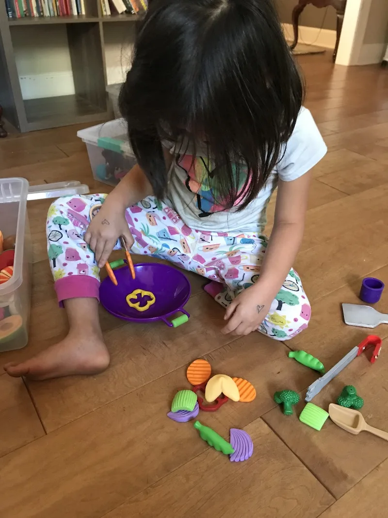 Great toys for kids with special needs: This toy wok set helps develop fine motor skills.