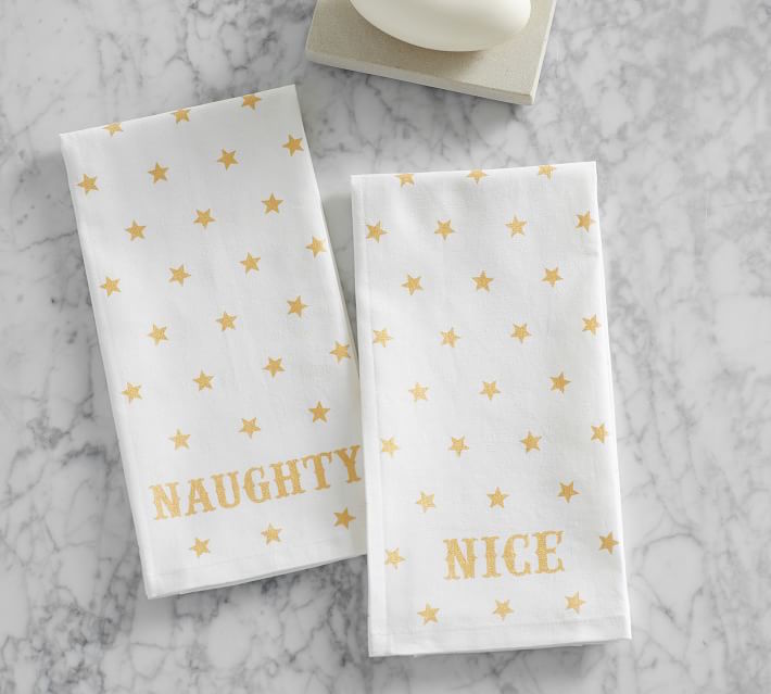 Funny hostess holiday gifts: The Emily & Meritt Naughty or Nice Guest Hand Towels at Pottery Barn Funny hostess holiday gifts: The Emily & Meritt Naughty or Nice Guest Hand Towels at Pottery Barn
