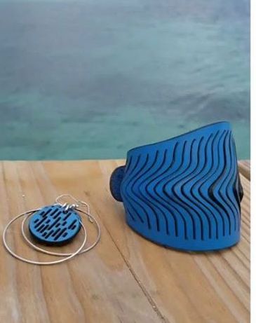 Amber Poitier handmade leather jewelry: cuffs, necklaces, handbags and earrings