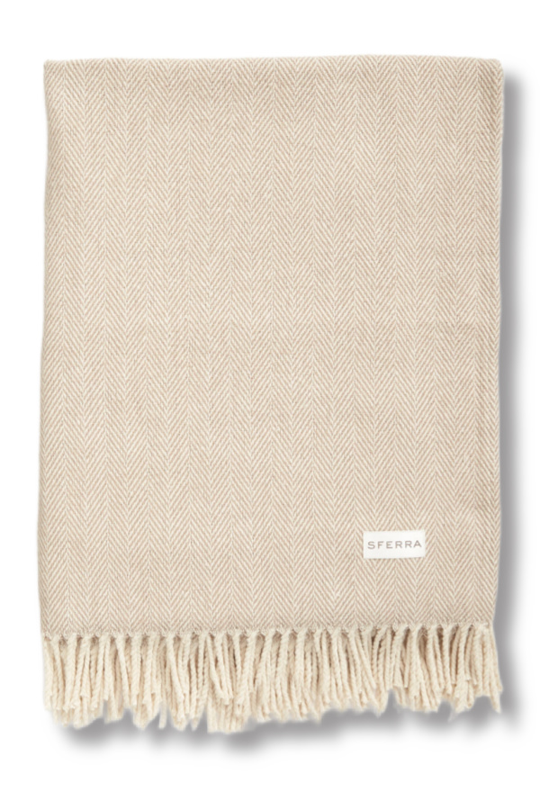 This cozy throw from Sferra makes a comforting mothers-in-law gift. This cozy throw from Sferra makes a comforting mothers-in-law gift.