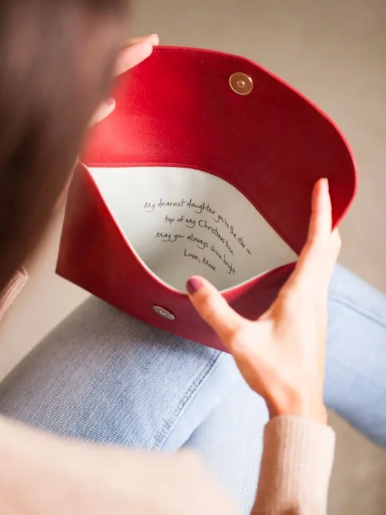 The best personalized gifts include these beautiful leather clutch from Fontem which have space for a handwritten message.
