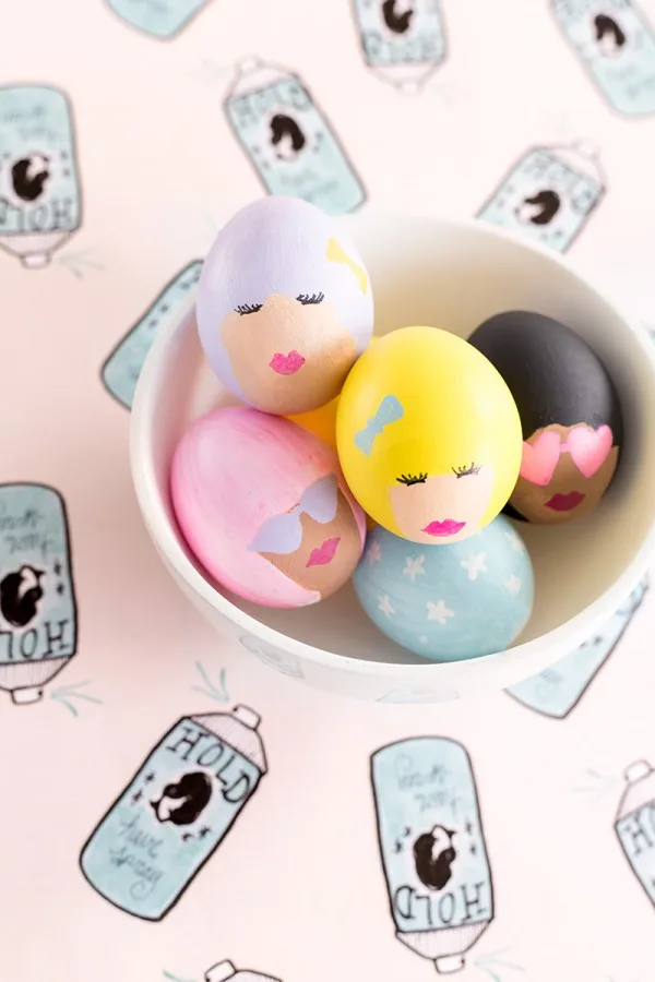 Monogrammed Easter eggs using stencils and Sharpies from Artzy Creations