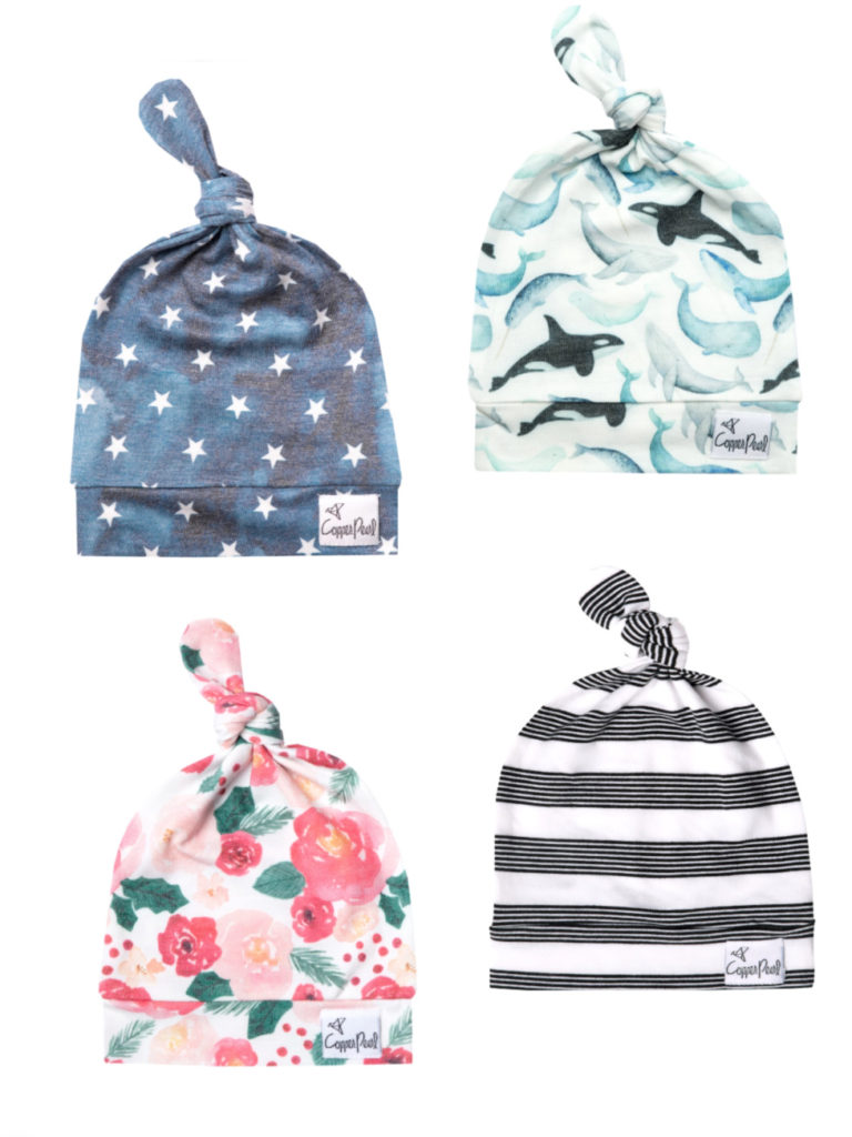 Best baby shower gifts under $15: Modern top knot baby hats by Copper Pearl | Cool Mom Picks Baby Shower Gift Guide