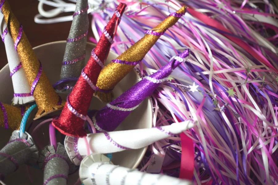 Dozens of magical unicorn birthday party ideas, like these unicorn party horns at Pretty Prudent