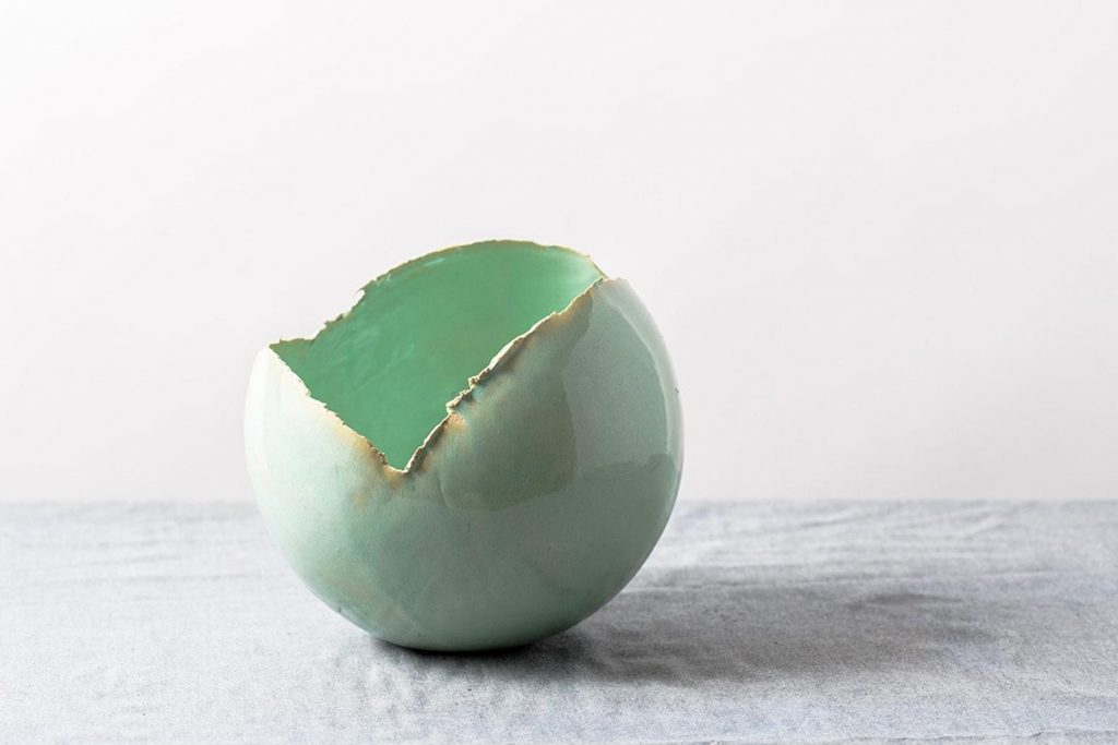 How to decorate with tea lights: Use a single, stunning votive like this one at Clay by Dannah to make a statement.