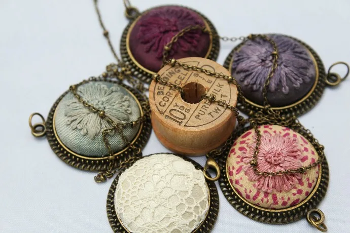 These gorgeous lace and embroidered necklaces by Ceci Leibovitz are great for moms and brides.
